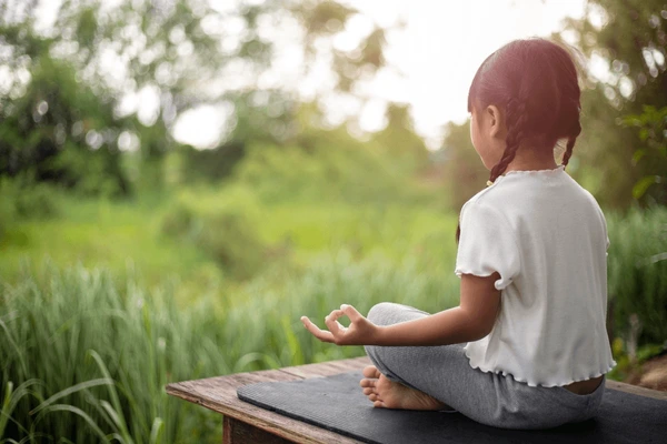 Child practicing mindfulness